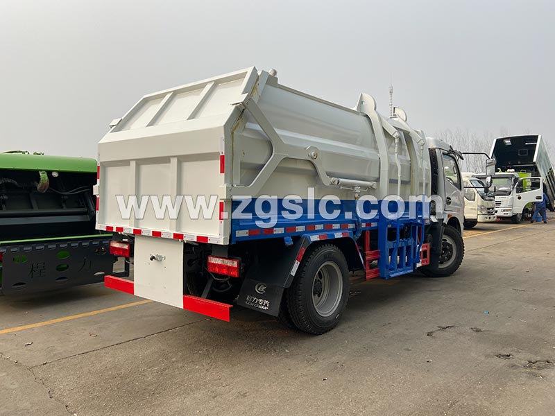 程力集團東風(fēng)大多利卡側(cè)裝帶壓縮垃圾車